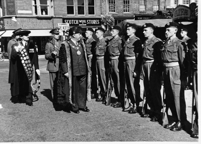 Mayor Frank Lowley inspecting troops, Market Square