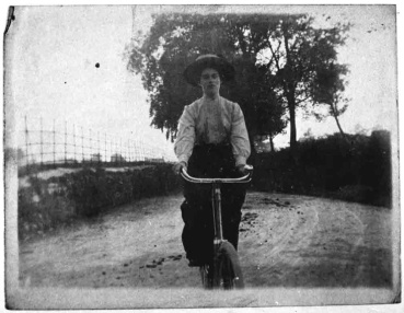 Longswales Bridge with lady cyclist, Kirkby Malzeard