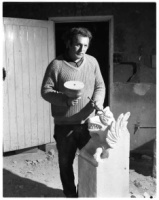 Frank Marshall carving a gargoyle