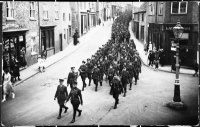 Column of soldiers marching down Skellgate