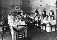 Wedding breakfast table and waitresses