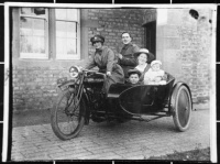 Ella Barker on motorbike with sidecar