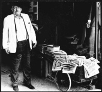 Arthur Bainbridge selling Sunday newspapers