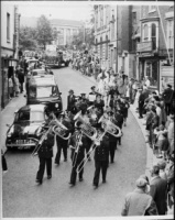 Brass band marching down Kirkgate during St Wilfrid's Day parade