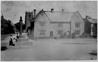 Cross and almshouses, Kirkby Malzeard